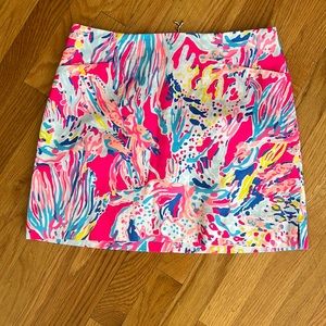 Pink patterned Lilly skort. Two pockets and adorned back zipper. Fully lined